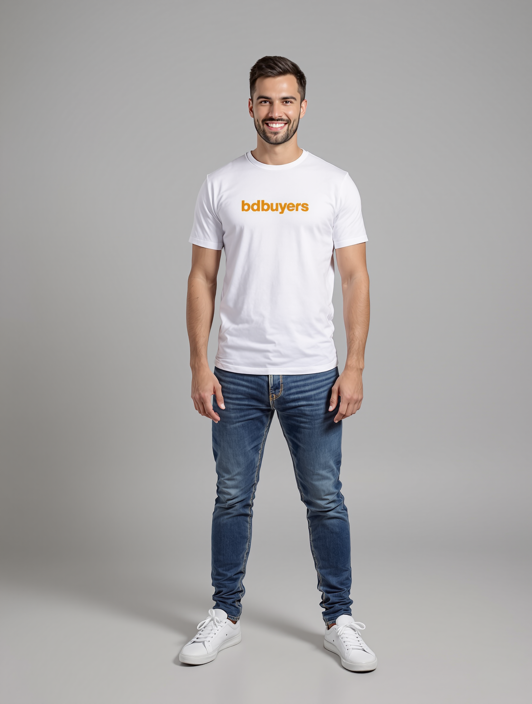 Man in white graphic t-shirt and blue jeans with white sneakers