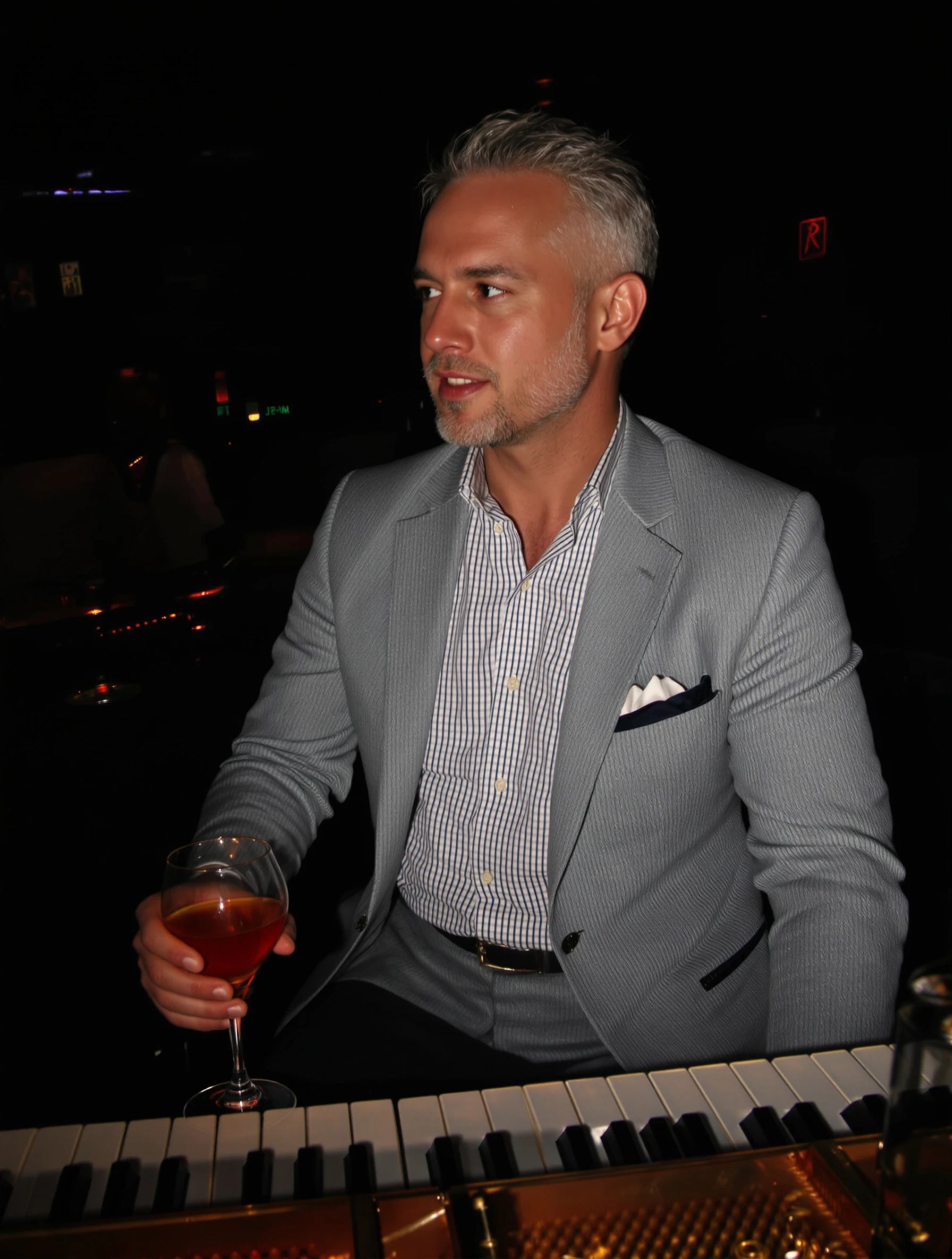 Sophisticated man at a jazz piano bar, enjoying live music with a cocktail. Smart casual evening wear, moody atmospheric