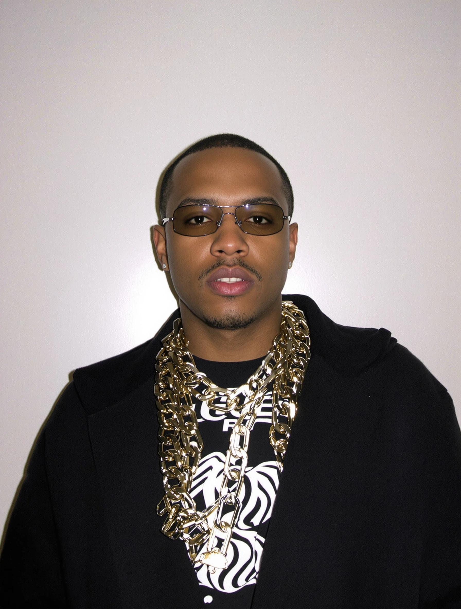 Man with chunky chain necklaces, 2000s hip-hop bling. Y2K jewelry, statement chains, masculine accessories, millennium flex.