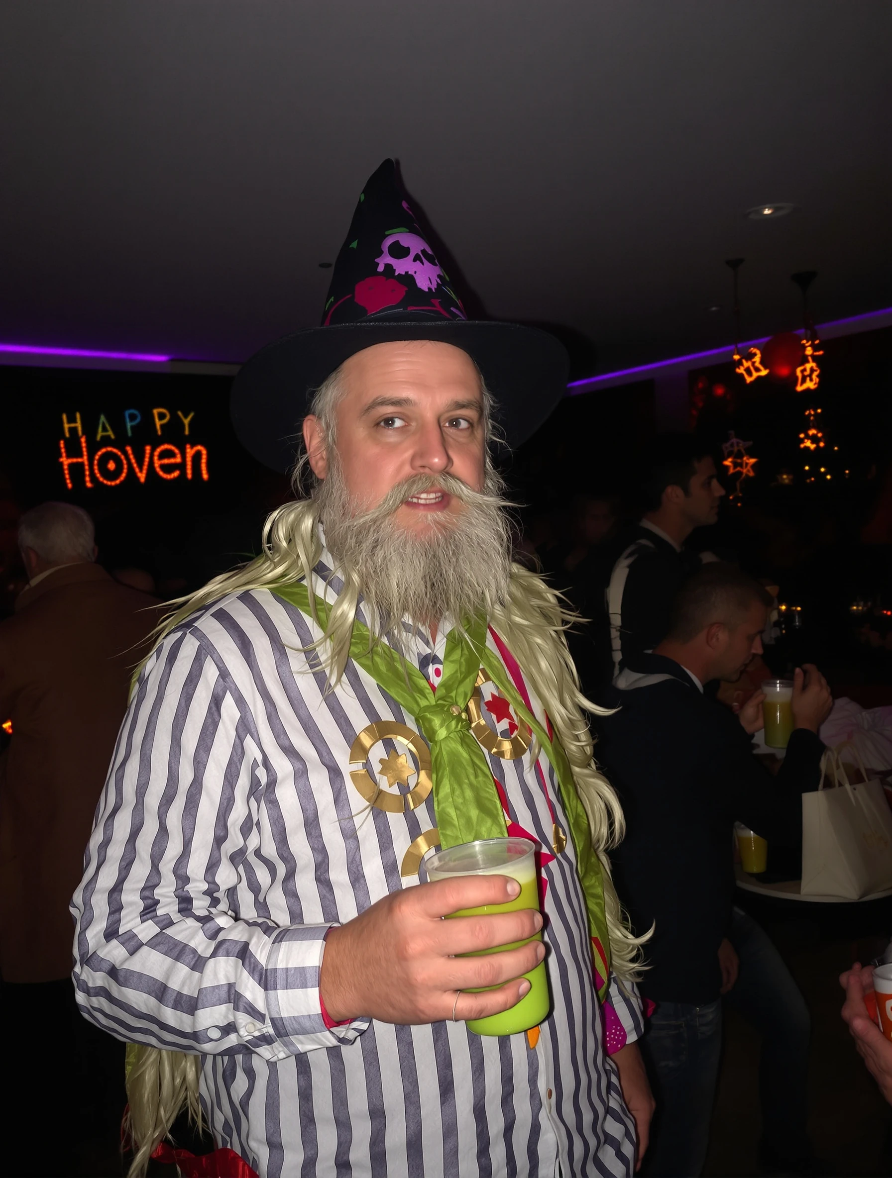 Man at Halloween party in creative costume, socializing and celebrating. Festive atmosphere, costume creativity, holiday fun, seasonal celebration.